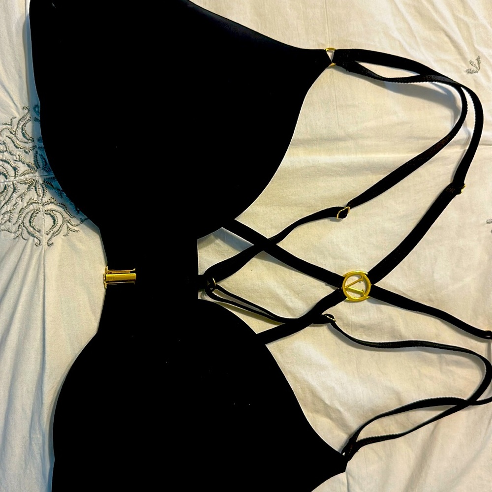 Brand new Victoria Secret bra black with gold accents.